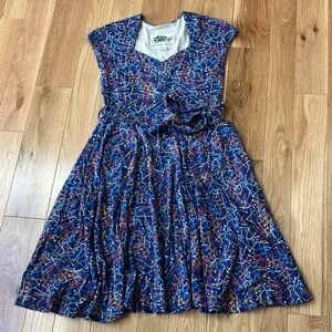 Effie's Heart Black and Cream Graphic Label on Printed Fabric